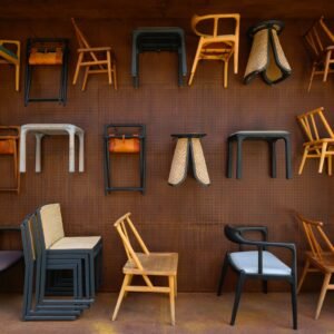 A room filled with lots of different types of chairs